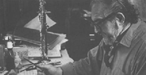 Meyer Kupferman composing at his desk